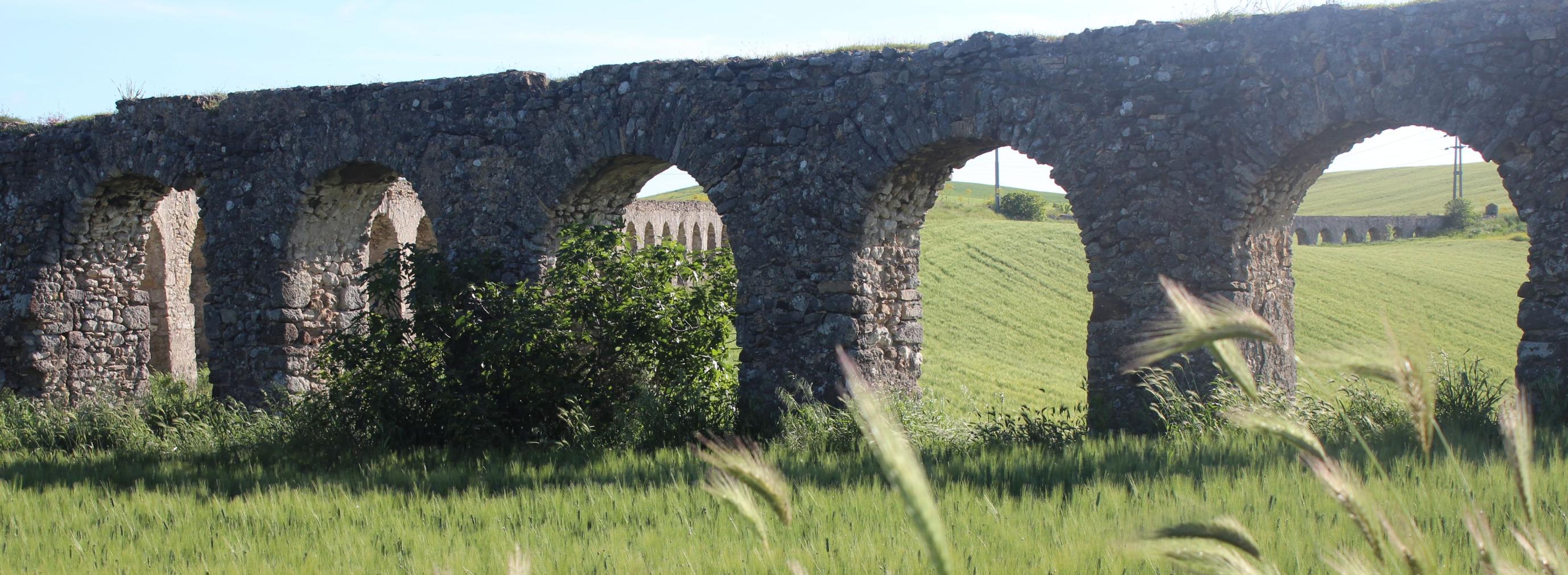Paesaggio con acquedotto